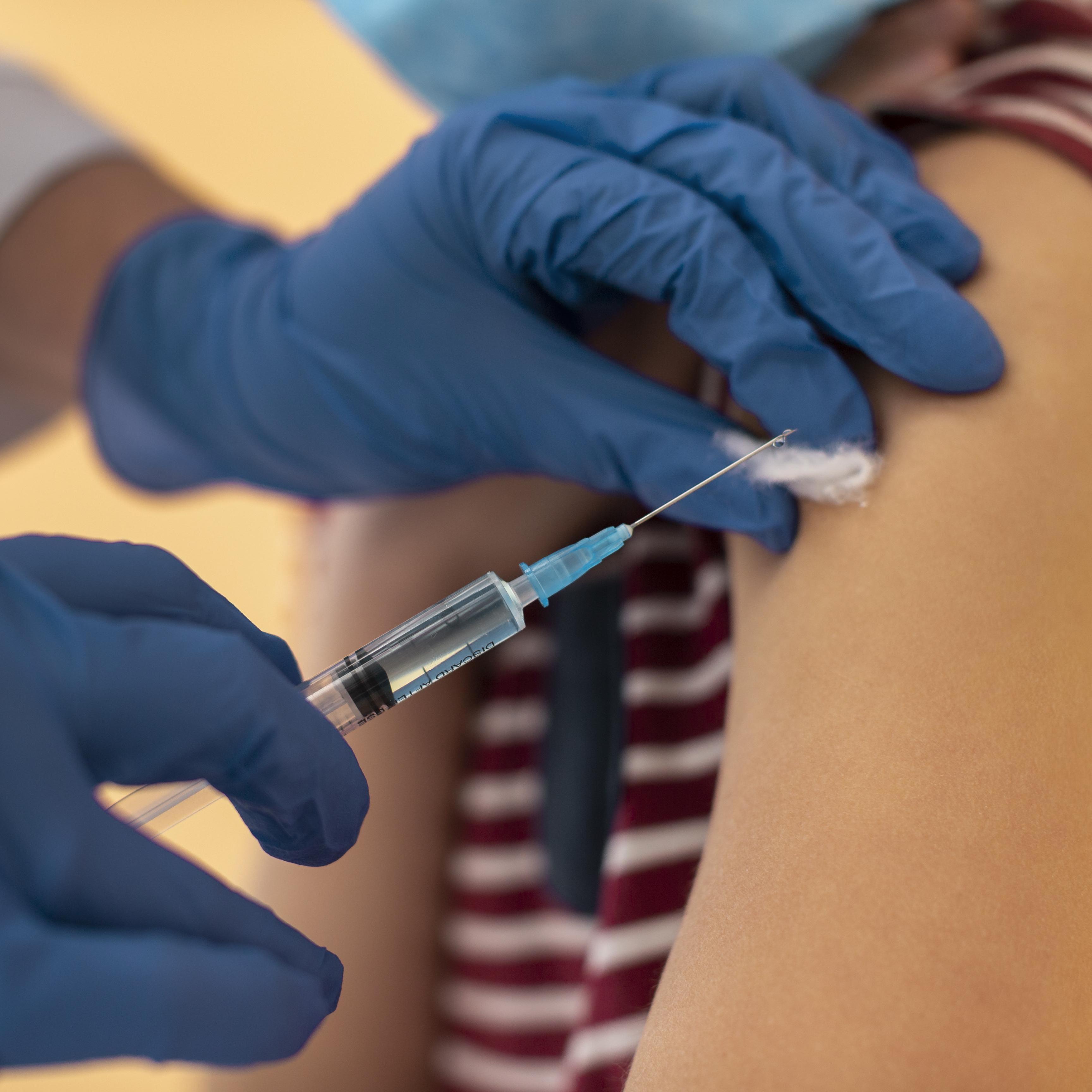 Man giving vaccine